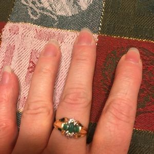 Emerald and diamond gold ring